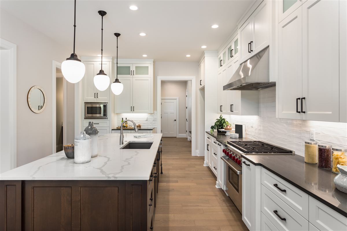 Modern kitchen with island — representative example photo