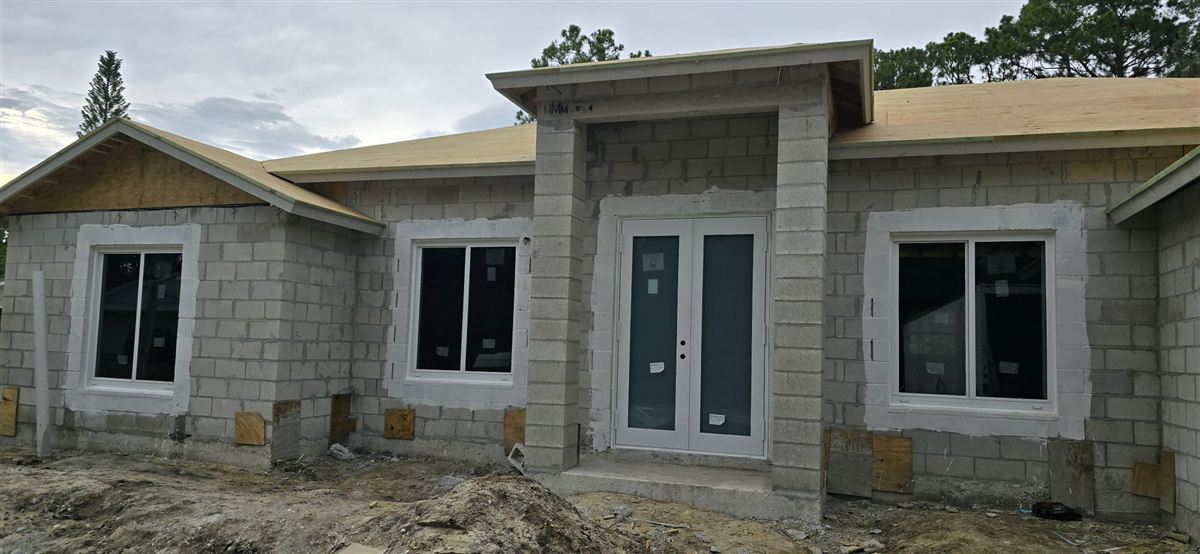 Concrete block home under construction by GRV