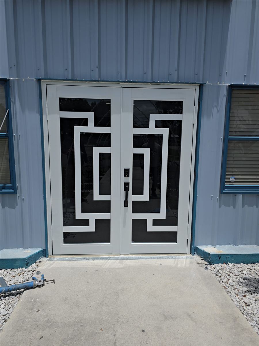 Glass double door installation on a commercial building